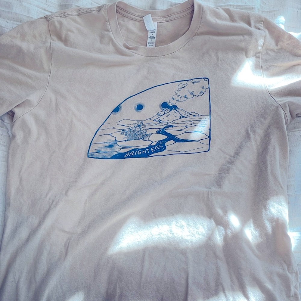 Tan bright eyes volcano shirt